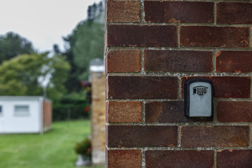 Security keyboard on a brick wall in a campground