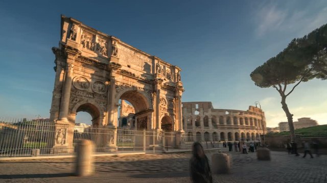 hyper lapse, Colosseum and Constantine arch at sunrise in Rome, Italy