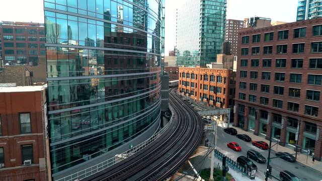 Trains curve through Downtown Chicago via the L CTA system