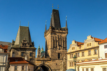 Lesser Town Bridge Tower with a gate, Malostranske mostecke veze, forming an entrance to the Mala strana from Charles Bridge in Prague, Czech Republic