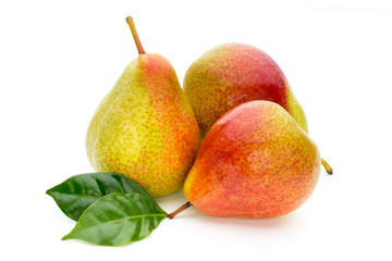 Fresh bio pear with leaves on isolated white background.
