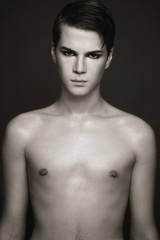 Fototapeta premium Vintage style duotone portrait of young beautiful sexy man