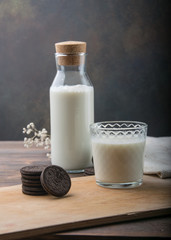 bottle of milk and a glass of milk