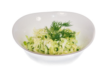  salad with cabbage in a plate isolate. decorated with greens. restaurant feed