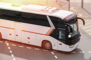 tourist bus on a city street © Yuri Bizgaimer