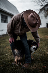 Naklejka na ściany i meble Cowboy pets farm dog