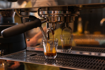 espresso machine pouring espresso, barista on work, cafe scene, making espresso