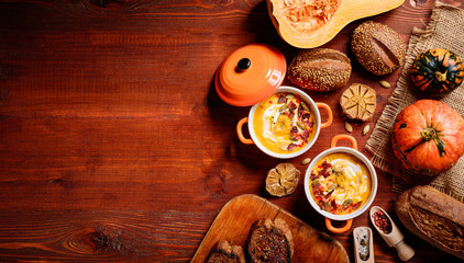 traditional pumpkin cream soup in a rustic style. healthy eating concept.