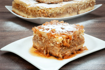Apple pie on wooden table