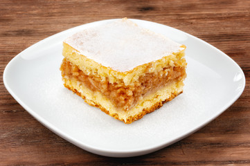 Apple pie on wooden table
