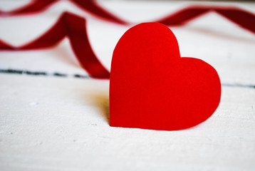Valentine's Day, paper heart on wooden background