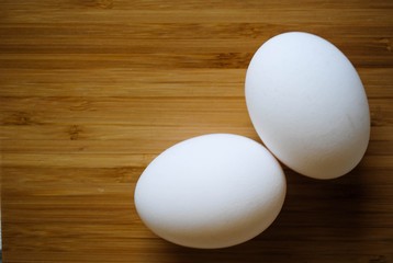 Chicken white eggs close-up on the table