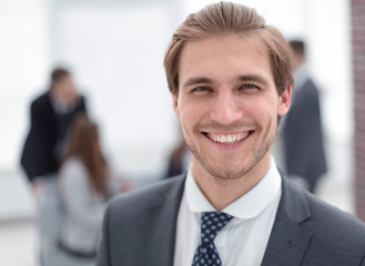 Fototapeta premium Portrait of a businessman in a modern office