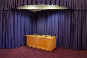 Interior of a Crematorium chapel with table for a coffin