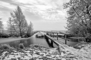 Frozen canal in northern part of the province of Drenthe in B&W