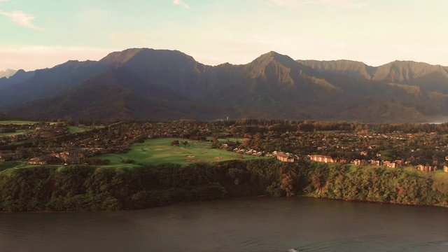 Princeville Kauai Bluffs Cinematic Panoramic Aerial Overview Film Look Mountains Coastline Red Sunlight