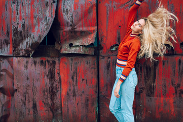 Lifestyle fashion portrait of young beautiful cute girl model.  Odd bizarre strange unusual cute...