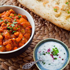 Chana Masala with Naan Bread and Raita - Indian Chickpea Curry.