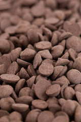 Background of Unsweetened Carob Chips a Healthy Alternative to Chocolate