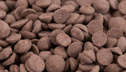 Background of Unsweetened Carob Chips a Healthy Alternative to Chocolate