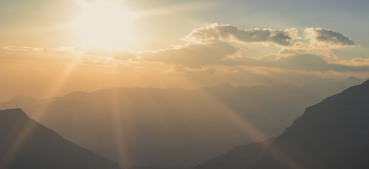 beautiful morning sun rise mountain silhouettes nature panorama landscape 