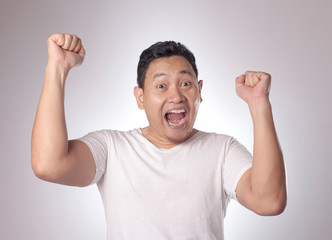 Fototapeta premium Surprised Happy Asian Man