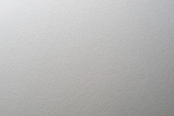 White artificial foam, foam texture on a light background.