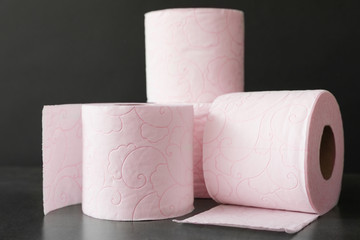 Soft toilet paper rolls on black background