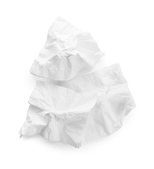Crumpled paper napkins on white background, top view