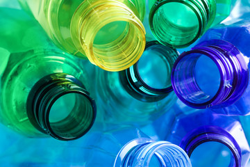 Used plastic bottles as background, closeup. Recycling problem