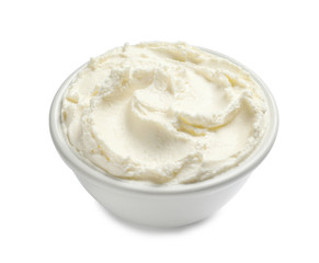 Bowl of tasty cream cheese on white background