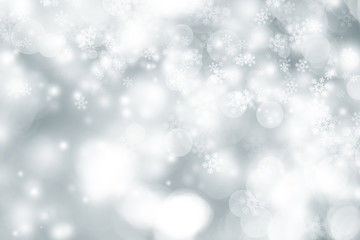 white snow blur abstract background. Bokeh Christmas blurred beautiful shiny Christmas lights. white and gray winter backdrop.