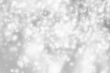 Fototapeta premium biały śnieg rozmycie streszczenie tło. Bokeh Boże Narodzenie rozmazało piękne błyszczące świąteczne lampki. białe i szare tło zima.