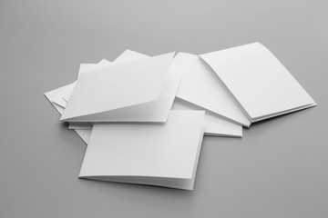Blank portrait mock-up paper. brochure magazine isolated on gray, changeable background / white paper isolated on gray