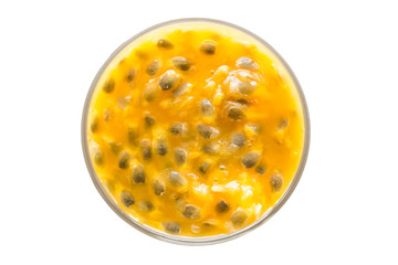 passion fruit in glass on white background.