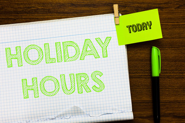 Writing note showing Holiday Hours. Business photo showcasing Schedule 24 or 7 Half Day Today Last Minute Late Closing Open notebook page markers holding paper heart wooden background