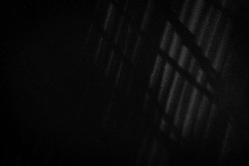 black texture or background with spotlight, dark wall backdrop wallpaper, dark tone.