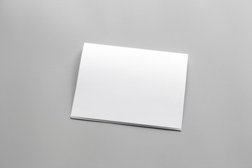 Blank portrait mock-up paper. brochure magazine isolated on gray, changeable background / white paper isolated on gray