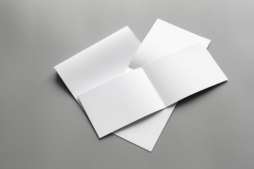 Blank portrait mock-up paper. brochure magazine isolated on gray, changeable background / white paper isolated on gray