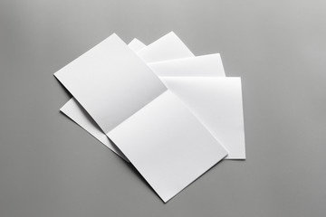 Blank portrait mock-up paper. brochure magazine isolated on gray, changeable background / white paper isolated on gray