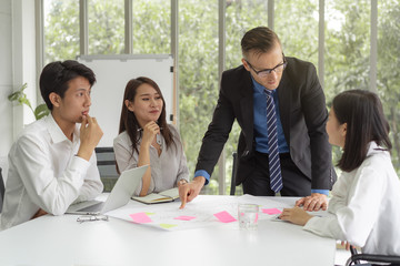 Business conference in organization. Close up group of marketing staff meeting and brainstorming in...