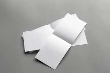 Blank portrait mock-up paper. brochure magazine isolated on gray, changeable background / white paper isolated on gray