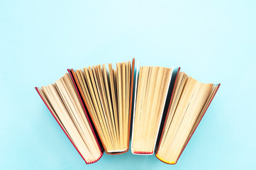 Open books on bright background