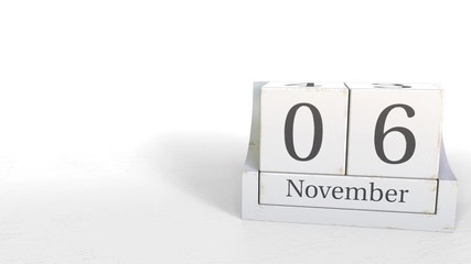 November 6 date on wooden blocks calendar. 3D animation