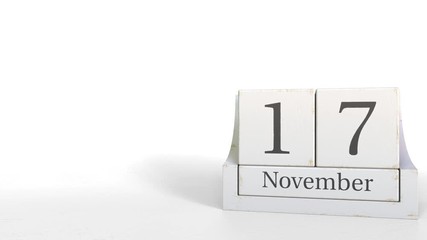 November 17 date on wooden blocks calendar. 3D animation