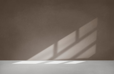 Brown wall in an empty room with concrete floor