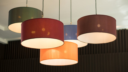 Suspended ceiling lamp with beautiful color hanging on the ceiling.