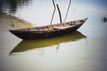 Fototapeta premium A boat in Thu Bon river - HOI AN ancient town