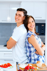Couple cooking together at home