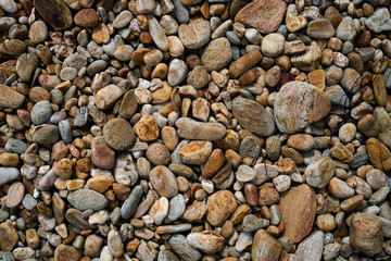 Many small stone brown color tone background.